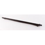 Leather covered cane; ebony and turned mahogany walking canes