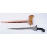 Malayan Kris, 14 ins watered steel blade, ebony hilt carved with scrolls, wooden scabbard with lower