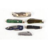 Boker stag handle lock knife; Buck Mini Trapper; Buck assisted liner lock knife; Kershaw Spur 1 lock