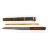 Oriental Trousse, the knife with an 8,1/4 ins blade, wood grips and brass finial, a pair of ivory or