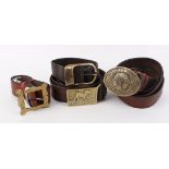 Smith & Wesson buckle plate on leather belt, together with four other leather belts