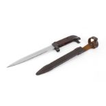 Russian AK-47 type bayonet, 8 ins single edged fullered blade, wood grips, in metal scabbard with