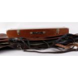 Fifteen various gun slips and wooden gun transport case