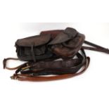 Two large leather Continental cartridge bags; canvas and leather game bag;