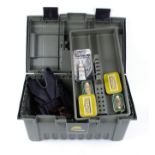 Plano hard plastic shooters case containing rifle rest and cleaning accessories