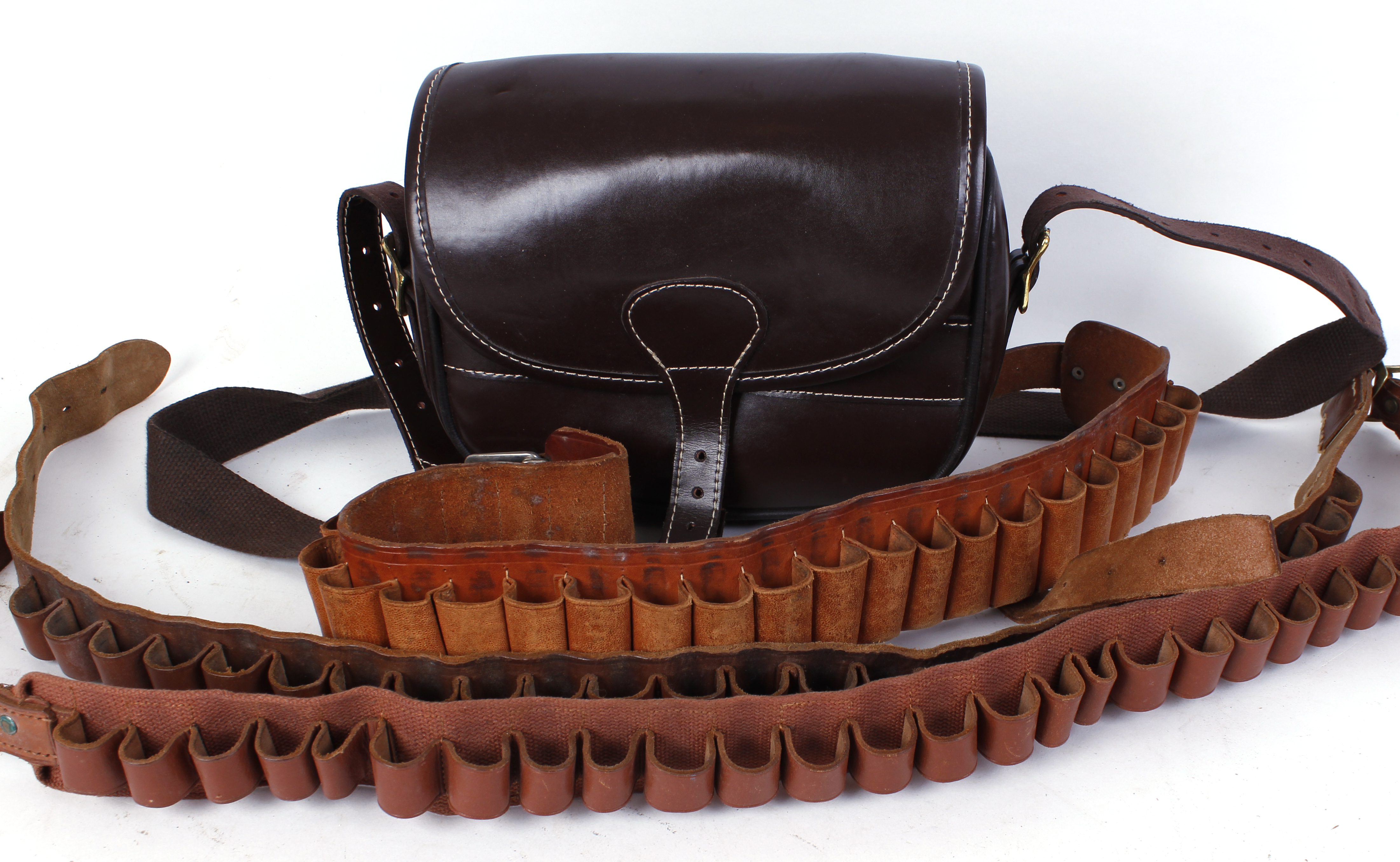 Three 12 bore cartridge belts and a cartridge bag