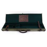 Lightweight canvas and leather gun case, fitted for up to 30 ins barrels, Harrison & Hussey trade