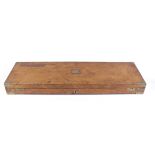 Oak gun case, fitted interior for up to 30 ins barrels, brass mounted with inset handle and vacant