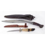 Judian kukri with wood grips in leather scabbard (a/f) with two skinning knives; sheath knife with