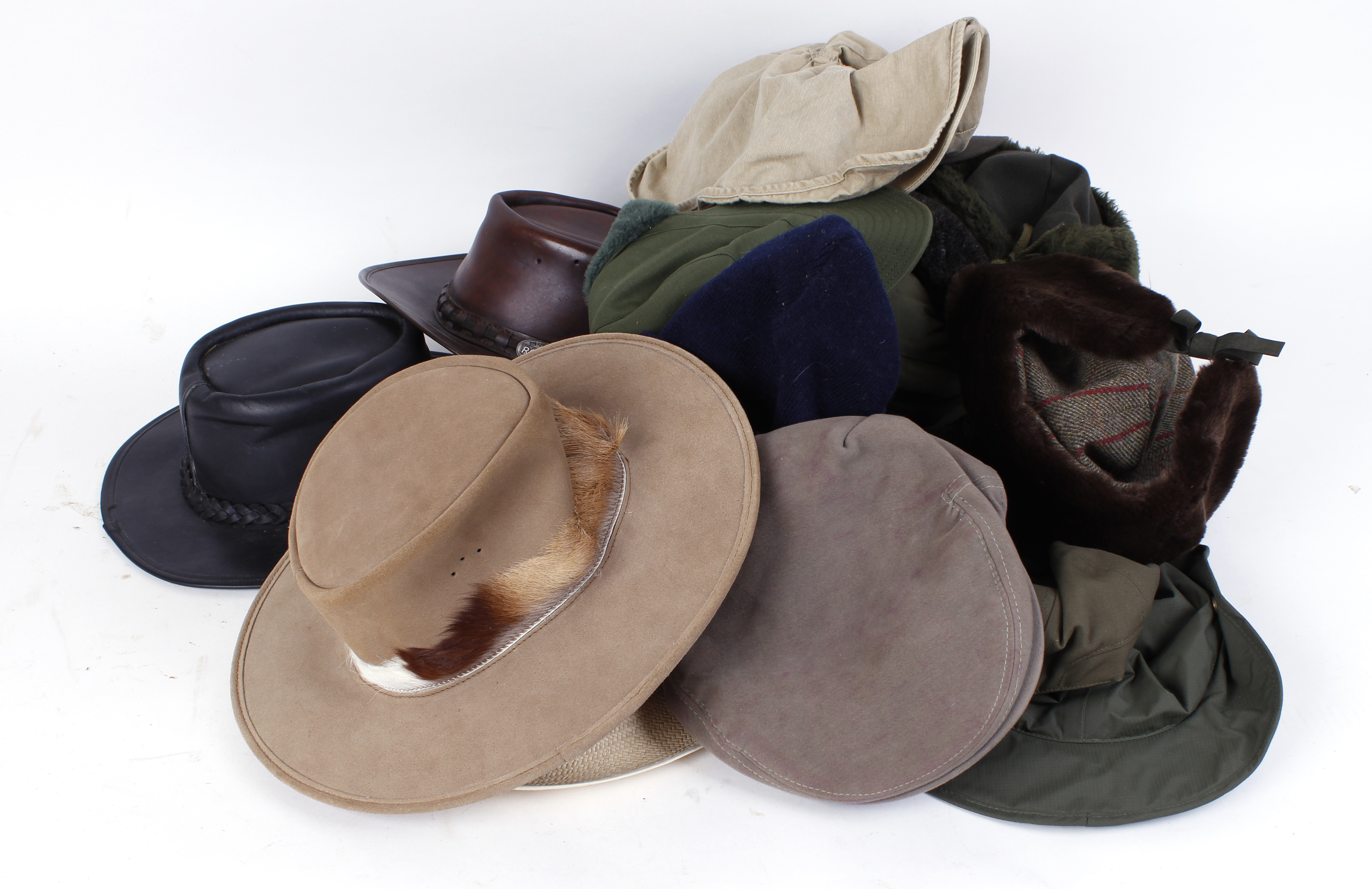 Box containing quantity of various hats and caps by Harkila, Beretta, Sealand, Barbour and others