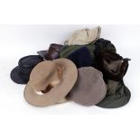 Box containing quantity of various hats and caps by Harkila, Beretta, Sealand, Barbour and others