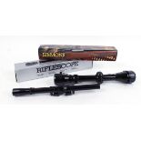 3-9 x 40 Simmons scope; 4 x 15 Nikko Cadet scope (2)