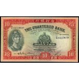 The Chartered Bank, $10, 6th December 1956, serial number T/G4125659, red, helmeted warrior at left