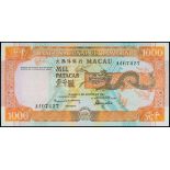 Banco Nacional Ultramarino, 1000 patacas, 1988, serial number AA07427, orange on multicolour underp