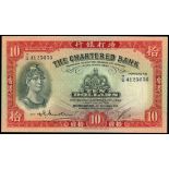 The Chartered Bank, $10, 6th December 1956, serial number T/G4125656, red, helmeted warrior at left