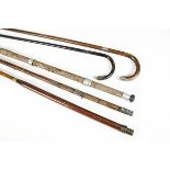 Angling Equipment, a pair of vintage fishing rods and odd sections together with a pair cane walking