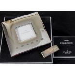 Aviation, a Hallmarked silver photograph frame by Carrs 12cm x 12cm with a 5cm x 5cm centre together