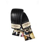 Muhammed Ali, a signed Ringmaster training glove with supporting photographs of the signing. The