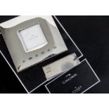 Aviation, a Hallmarked silver photograph frame by Carrs 12cm x 12cm with a 5cm x 5cm centre together