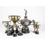 Trophies, eight Newbury athletic trophies that includes a two handled silver cup made by Elkington