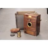 A H. Martin Wooden Tailboard Camera, with unmarked Waterhouse stop brass lens, with four DDS