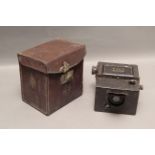 Ensign Reflex Camera, focal plane roll film model with makers case