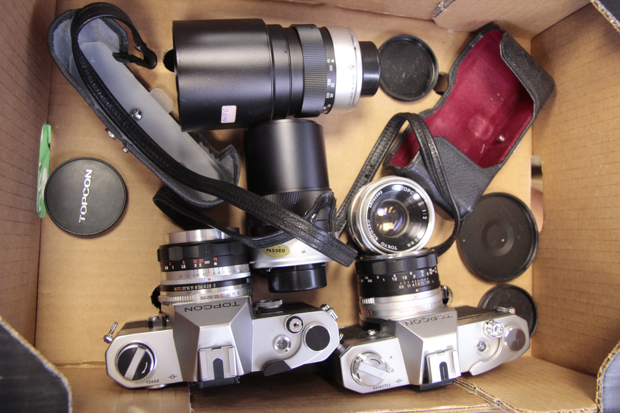 Two Topcon SLR Cameras, including IC-1 Auto and Unirex, together with various lenses (a lot)