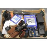 A Nikon FE SLR Camera, together with various accessories including Nikkor f/2.8 28mm lens and