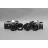 Two Pentax SLR Cameras, together with two additional lenses (a lot)
