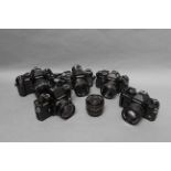 Four Yashica SLR Cameras, including FX-3 Super 2000, with Carl Zeiss Planar T* f/1.7 50mm lens,