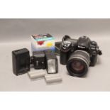 Nikon D200 Camera, with an f/3.8-5.6 28-200 Tamron Aspherical lens and other items