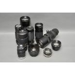 A Selection of Various Lenses, including Minolta Rokkor-PF f/1.7 55mm, Prinzgalaxy f/3.5 135mm and