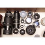 Lenses, a range of optics including an f/4 85-250 Enna Tele-zoom with others from Schacht and