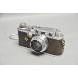 A Leica III Bright Chrome Rangefinder Camera, serial no. 130397, with Leitz Summar f/2 50mm lens,