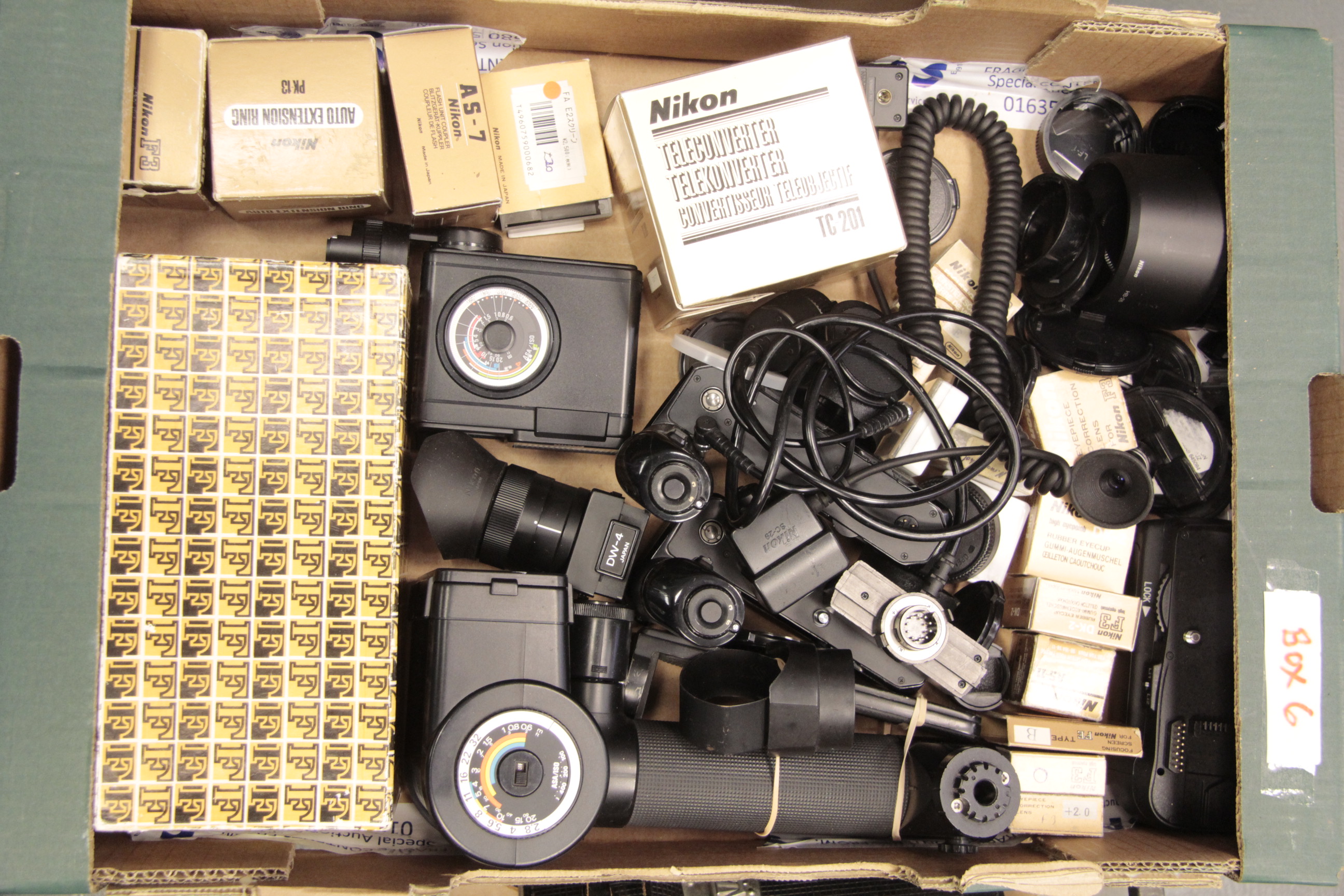 A Large Selection of Nikon Accessories, including battery grips, screens, magnifiers, flash units