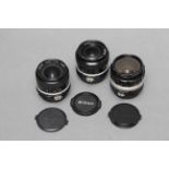 Three Nikon Lenses, including f/2.8 24mm, f/2.8 35mm and f/2 35mm (3)