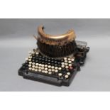 A Royal Bar-Lock Typewriter, black paint polished away leaving brass to name plate