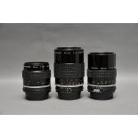 Three Nikkor Lenses, including f/2.8 55mm, f/4 105mm and f/2.8 135mm (3)