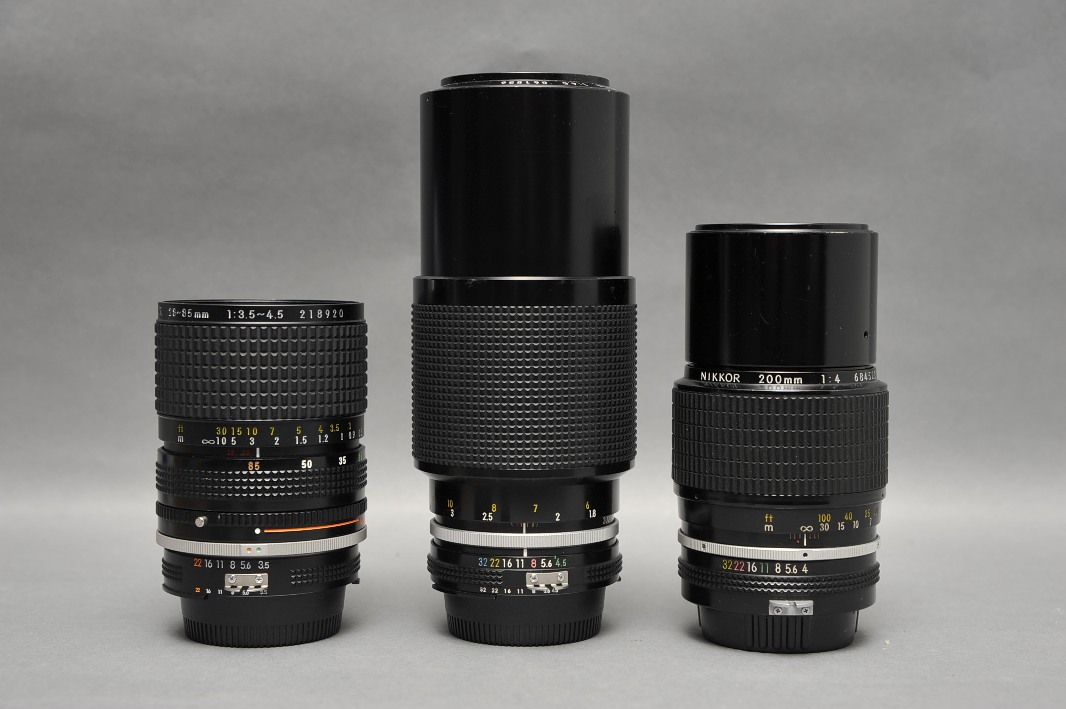 Three Nikkor Lenses, including f/3.5-4.5 28-85mm, f/4 200mm and f/4.5 80-200mm (3)