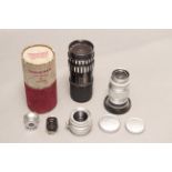 Leica Screw Lenses, an f/3.5 35mm Summaron, an f/4 90mm Elmar, an f3.5 135mm Schacht together with