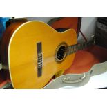 Acoustic guitar, stamped BM ltd, Espana, some wear and appears to be repair to bottom edge