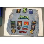 Denim Jacket, sleeveless jacket medium covered with heavy metal cloth badges, mainly Metallica