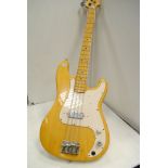 Electirc Guitar, A vintage Sakai bass with natural finish, in good condition control knobs not