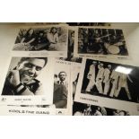 Photographs, eighty plus promotional mostly 8" X 10" including John Mayall, Squeeze and Buddy