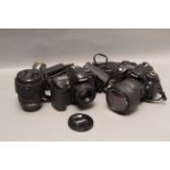 Nikon DSLRs, a D80 with 18-200 Nikkor, a D100 with an f/1.8 50mm and an 18-135 Nikkor and more