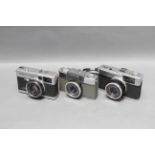 An Olympus 35EC Compact Camera, together with an Olympus Trip and Olympus Pen (a lot)
