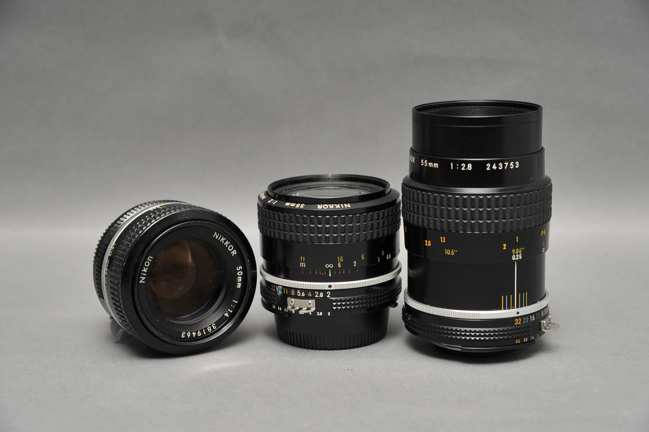 Three Nikkor Lenses, including f/2 35mm, f/1.4 50mm and f/2.8 55mm (3)