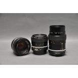 Three Nikkor Lenses, including f/2 35mm, f/1.4 50mm and f/2.8 55mm (3)