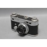 A Perfex Fifty Five Rangefinder Camera, with Wollensak f/2.8 50mm lens