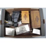 A Selection of Early Darkroom Equipment, including black tin safe lights, processing tanks and